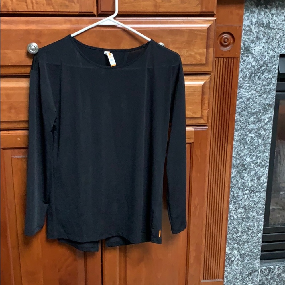 Extra Stylish Lucy Top. Size xs runs big.